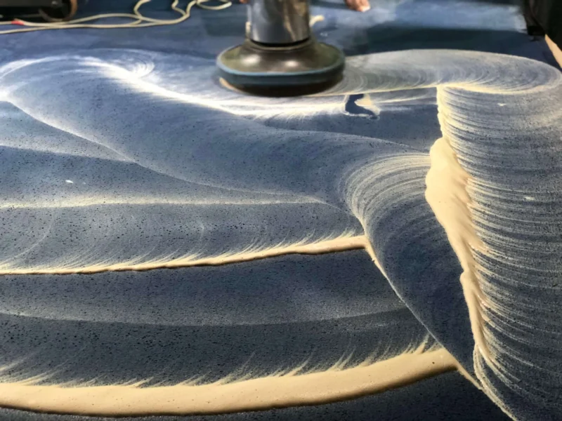 Dirty carpet being cleaned by Aspire Cleaners Uganda