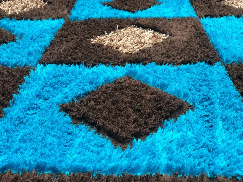 Ugandan carpet cleaning specialists removing deep stains from carpets with advanced stain removal technology.